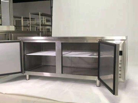 Stainless steel commercial refrigerator workbench in the back kitchen of hotel restaurant